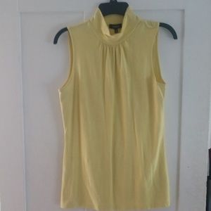 Sleeveless yellow turtleneck